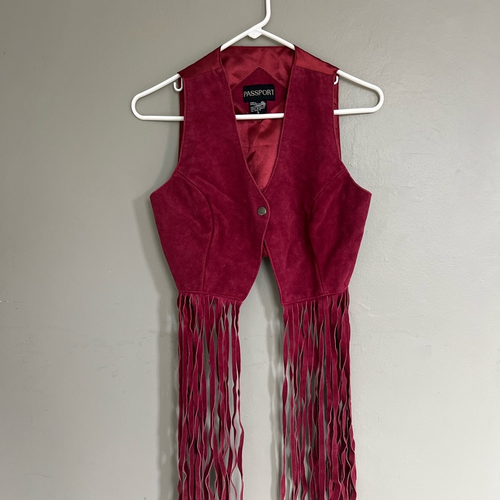 Leather Passport Vest with fringe. Women’s size small.